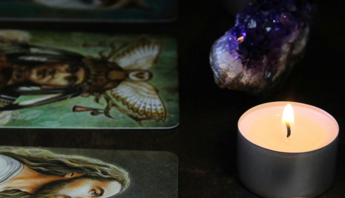 white candle on black table